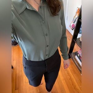 New with tags on. Silky green button down. Dress up or dress down
